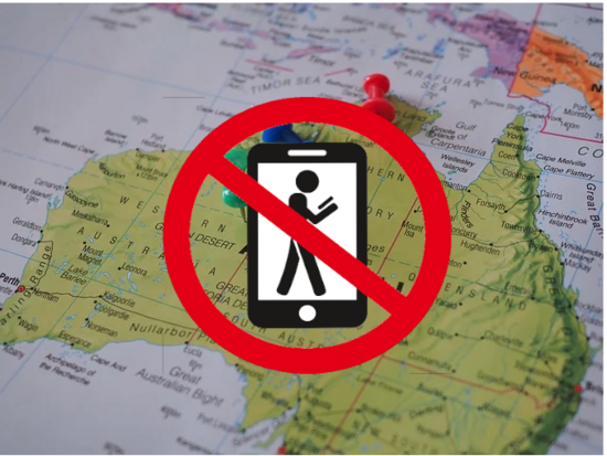Australischer Kontinent mit Verbotsschild auf dem ein Strichmännchen mit Handy in der Hand ist